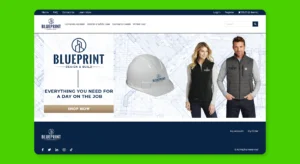 A promotional products company store with construction-themed products, including a hard hat and vests, all branded with a "Blueprint" logo.