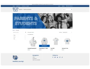 A mockup of an e-commerce website for Westfield Lake High school apparel. The page features a blue and white color scheme, a banner reading 'Parents & Students' over a black-and-white photo of cheering fans, and a product grid displaying a hooded sweatshirt, a long sleeve t-shirt, a tee shirt, and a women's tee, all bearing a blue 'W' logo.